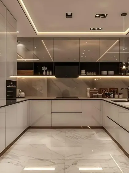 A sophisticated kitchen with grey-toned glossy cabinets and a white marble floor. We included glass-fronted display cabinets with internal lighting to showcase fine dinnerware, adding a touch of elegance and personality.