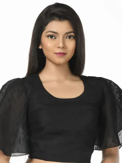 A black blouse with dramatic bell sleeves, perfect for adding a touch of flair to your look.