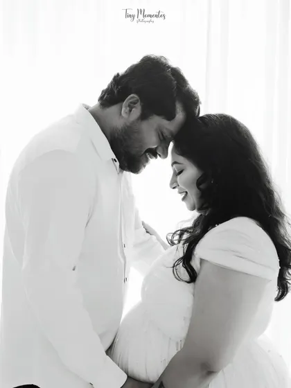A timeless black and white portrait that strips away all distractions, focusing purely on the joy and intimacy shared between you and your partner.