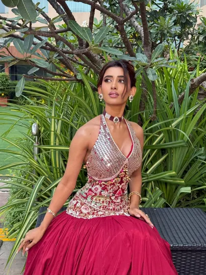 A regal pose that captures the essence of this modern-meets-traditional look. The skin is glowing and the makeup is flawless.