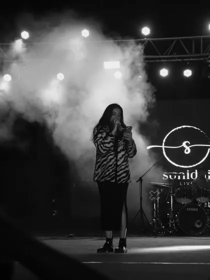 Another perspective of the RVCE show, with my logo on the screen behind me. It was a night of great music and high energy.