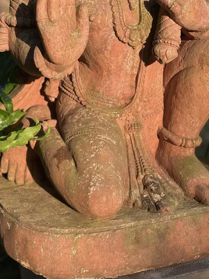 A detail shot of the lower half of our sandstone Hanuman statue, showing the texture of the stone and the artistry of the carving.