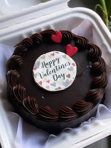 Our Valentine's Day chocolate bento cake is a perfect personal gift. This rich mini chocolate cake is decorated with a "Happy Valentine's Day" message.