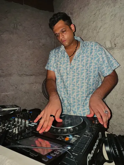 In the zone at Nomi club. I am deeply focused on the technical details of the mix to ensure the sound is perfect.