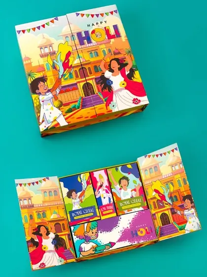 A playful and vibrant Holi gift box. The unique packaging opens up to reveal an assortment of colorful gulal, making it a fun surprise.