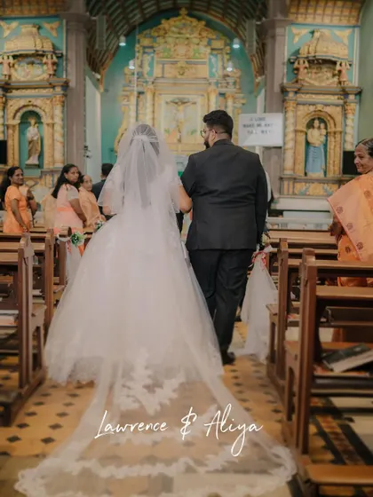 I adapt my style to honor every tradition. Here, I captured the serene and solemn walk down the aisle at a beautiful Christian wedding in a Mumbai church, focusing on the grace of the moment.