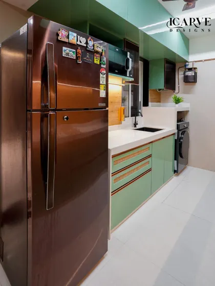A full view of the mint green kitchen, showing how all the elements come together to create a cohesive and stylish space.