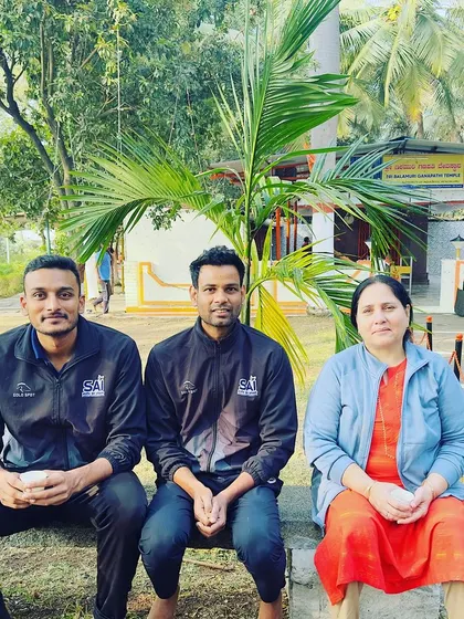 A quiet moment with Ritu Pathik mam, the Regional Director of SAI Bangalore, after a temple cleaning activity. Service and humility are important values both on and off the court.