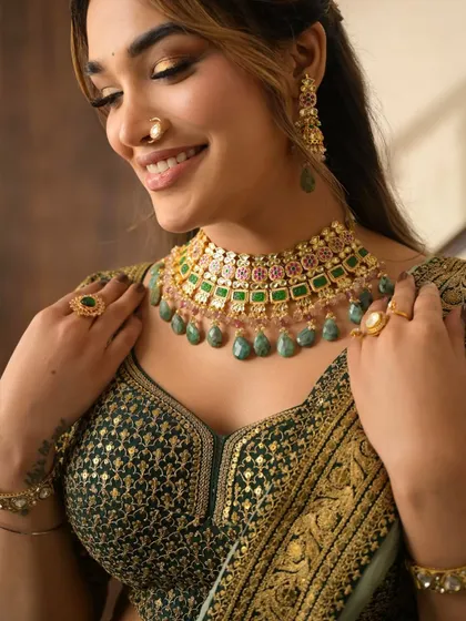 Serving festive elegance with a side of glow. This look is all about radiant skin, softly sculpted features, and a perfect blend of tradition and trend for any celebration.