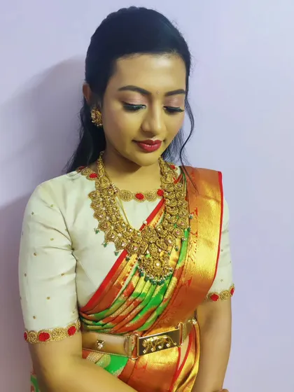 Another angle of this elegant look, showing how the makeup looks flawless and smooth from all sides.