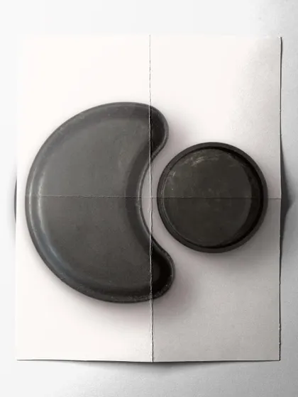 A stylized shot of the jet black concrete tray set, highlighting its minimal and modern aesthetic.