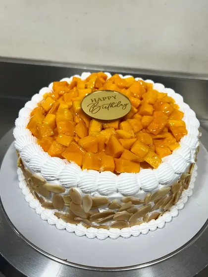 When mango season hits, my kitchen is filled with the scent of fresh Alphonsos. This Mango Almond Gateau is a true celebration of the king of fruits, loaded with fresh mango chunks and toasted almonds.