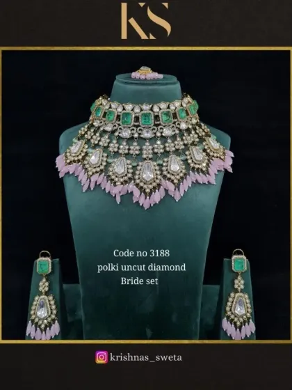 The same polki bridal set, shown with soft pink tassels. This demonstrates how we can customize pieces to match your bridal outfit.