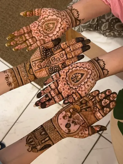 Another angle of the bride tribe's henna, showing the beautiful details and patterns on each hand.