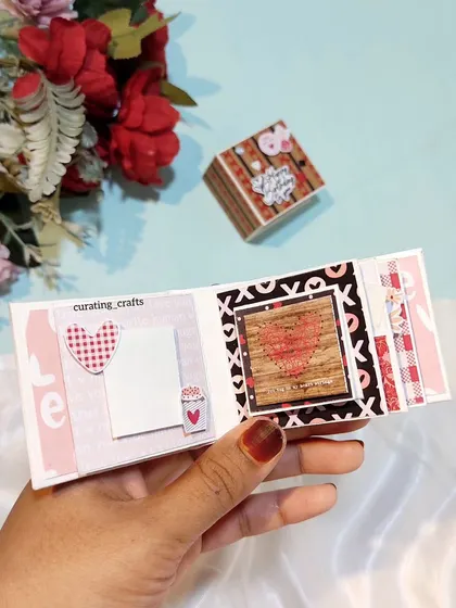 This tiny scrapbook combines different patterns like gingham and hearts for a cute, eclectic look.