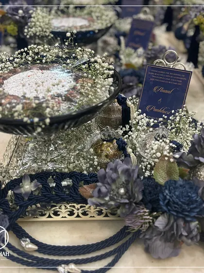 An alternative arrangement of the Azure Crystal Bowl Hamper, this time with ornate jars instead of potlis. The intricate silver-plated tray and floral details complete this elegant composition.