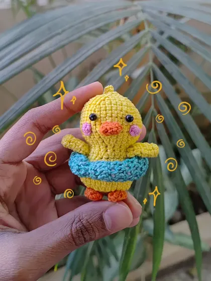 This little duckling is ready for a swim with its own tiny floatie! I love adding cute accessories to my animal creations to give them more personality.