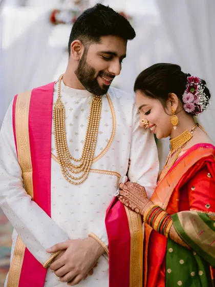 A gentle, loving glance between Zaee and Kartik during their traditional engagement ceremony.