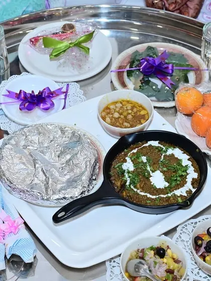 I specialize in catering for traditional Bohra functions. This is a Shitabi thal I prepared for a shadi majlis, complete with all the customary dishes. I work closely with you to ensure the menu is perfect for your specific customs and event.