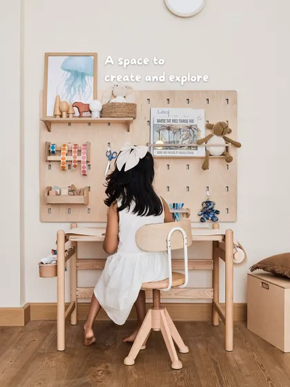 This art table and pegboard create a dedicated space for my daughter to create and explore. Having her materials accessible fosters independence and creativity.