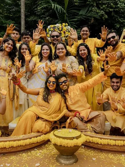 The grand entrance with colorful smoke bombs makes for an epic start to the Haldi festivities. We love capturing the energy and excitement of the wedding party.