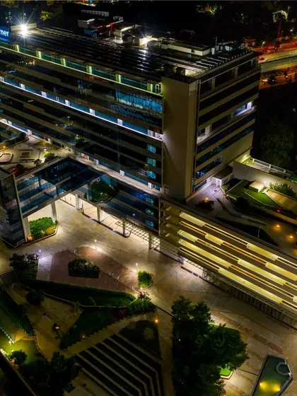 A similar high-angle night view, showcasing our ability to capture comprehensive and aesthetically pleasing shots of large corporate properties for owners and developers.