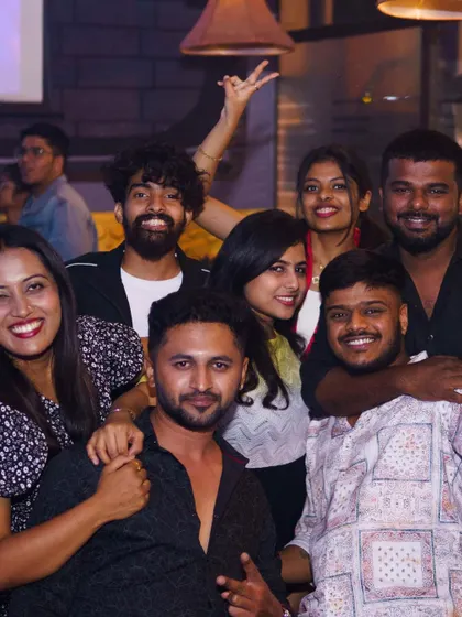 The whole crew is here for a good time. Group photos like this capture the community and shared experience of a great club night.