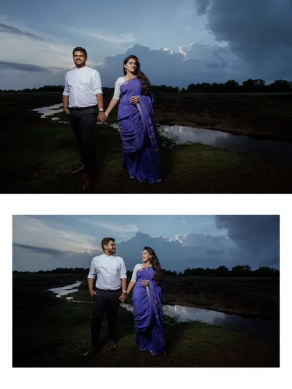 A dramatic, wide-angle shot of a couple holding hands in a vast, open field under a stormy sky, creating a powerful and cinematic pre-wedding portrait.