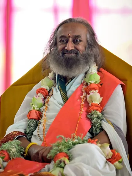 A smiling portrait of me during the Rishi Homa. Navratri is a time of immense joy, and that happiness is reflected on the faces of everyone present.