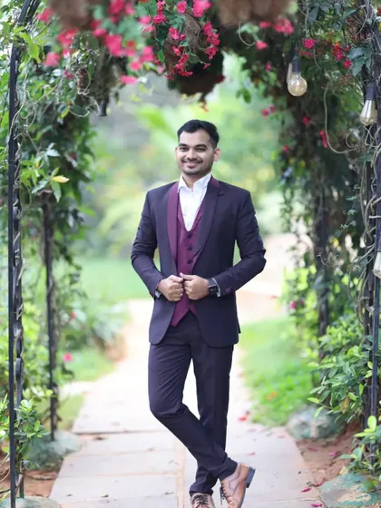 Look sharp and polished for any event with my collection of men's suits for rent. This classic three piece suit in a deep wine color is perfect for weddings, corporate events, or a sophisticated pre-wedding photoshoot.