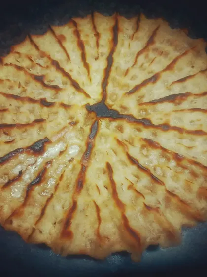 Khoba Roti, a traditional Rajasthani bread cooked over an open fire to get its unique texture and smoky flavour.