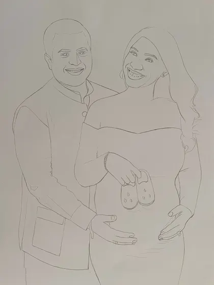 The delicate outline of the maternity portrait. Every piece begins with a careful, light sketch to ensure the composition and proportions are perfect before any shading begins.