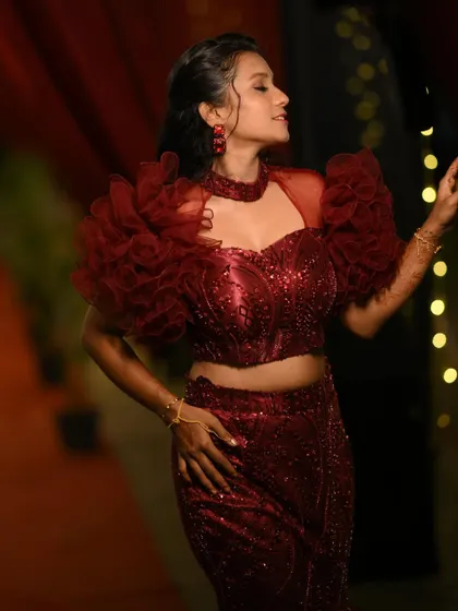 A candid moment of Anusha, her joy lighting up the room.