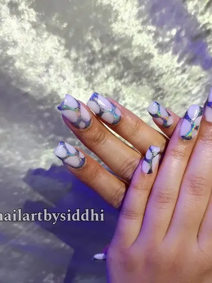 A unique design featuring a 3D chrome swirl pattern over a white base for a futuristic and textured look.