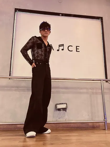 The same stylish outfit, captured from a slightly different angle to show the full silhouette.