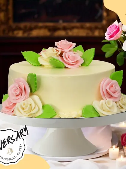 A sweet floral cake to celebrate Mr. and Mrs. Rawat's anniversary in Jor Bagh. The soft buttercream is adorned with beautiful pink and white sugar roses, making it a lovely tribute to their journey.