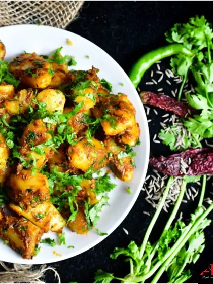 A collection showing the variety of our curries, from the preparation of Chicken Tikka Masala and smoky Kadai Paneer to finished bowls of Palak Paneer, Jeera Aloo, and Chicken Kadai. Each dish is prepared fresh and served hot.