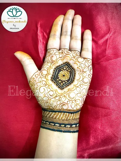 The same cutwork design before the filling. This shows how the intricate outlines are drawn before the dark paste is applied to create the beautiful final effect.