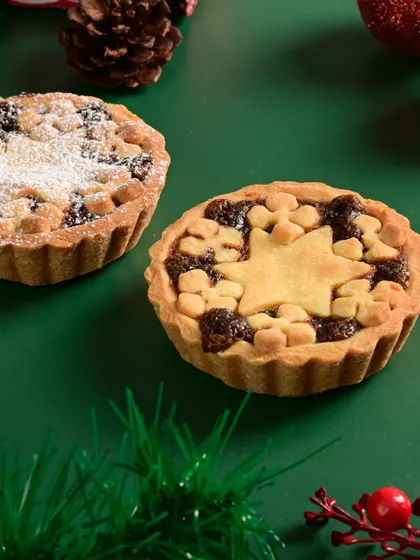 Classic Christmas mince pies, with a rich, spiced fruit filling in a buttery pastry case.