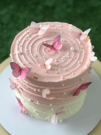 Another view of the pink ombre butterfly cake.