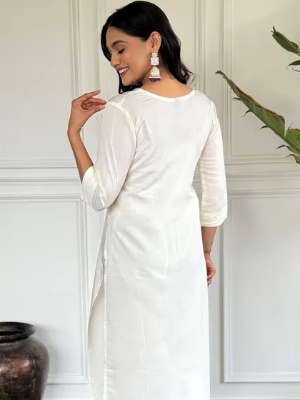 An elegant white chanderi kurta paired with a beautiful printed lavender dupatta. It's a classic combination that's perfect for a sophisticated, graceful look.