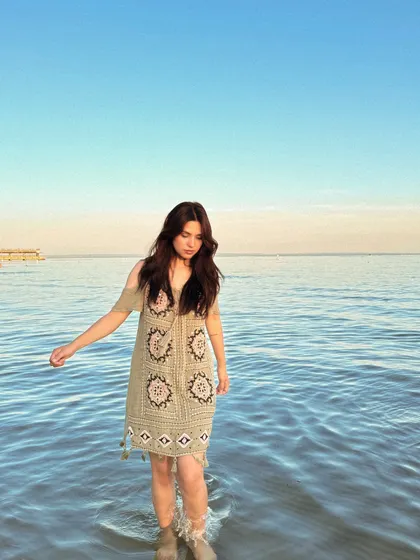 Another shot of me wading in the water, capturing a candid moment.