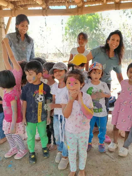 A happy, colorful group photo from our farm trip. Combining a field trip with a festival celebration created a truly memorable day for everyone.