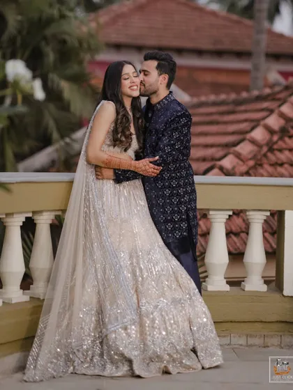 A sweet embrace captured during the couple's Sangeet in Goa.