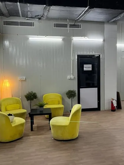 The interior of an IKEA project office space featuring a comfortable waiting area created with our PUF panels. This project with Abhiyan Construction showcases our ability to supply panels for modern commercial interiors.