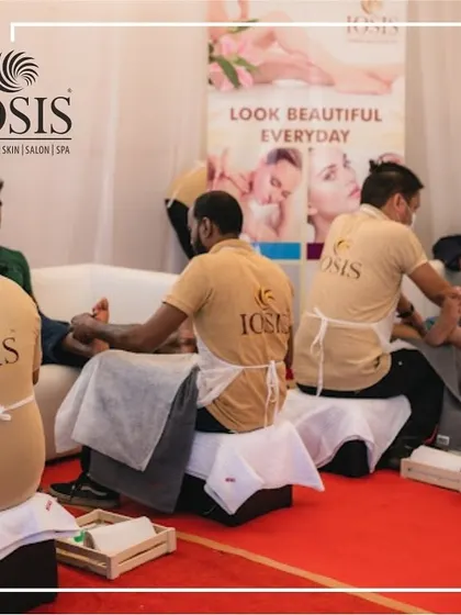 Our therapists providing on-site foot massages at a corporate event. Offering wellness services is a great way to make any gathering more memorable and show appreciation for your guests.
