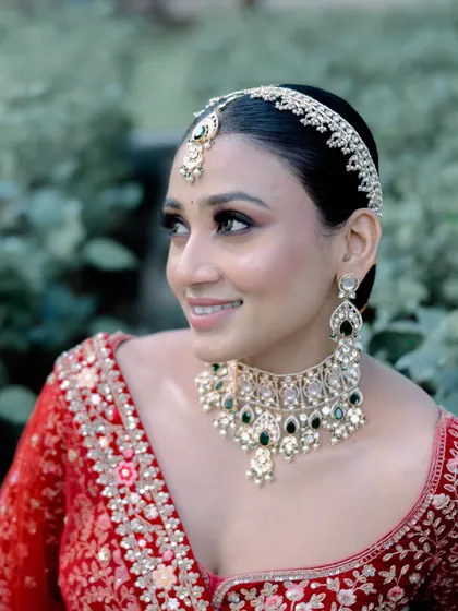 A happy bride is the most beautiful bride. Her smile here is everything, and I'm so glad I could create a look that made her feel this confident and radiant on her big day.