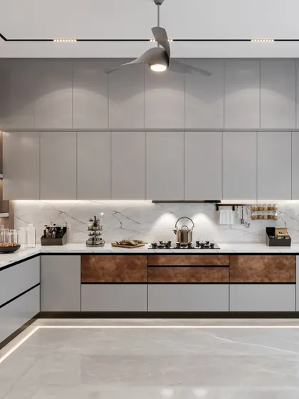 This view highlights the seamless integration of the marble countertop and backsplash. The open decorative shelving adds a touch of personality and provides space for styling, breaking the monotony of the cabinetry.
