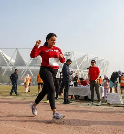 A runner finishing her first-ever 10,000-meter track race. She suffered but loved every bit of it, a true mark of a resilient athlete.