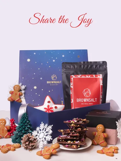 Our gifting solutions go beyond a single season. Here is our "Share the Joy" Christmas hamper, filled with festive treats like gingerbread cookies, chocolate barks, and our special Xmas Granola. It shows our capability to create unique, themed hampers for any corporate celebration throughout the year.